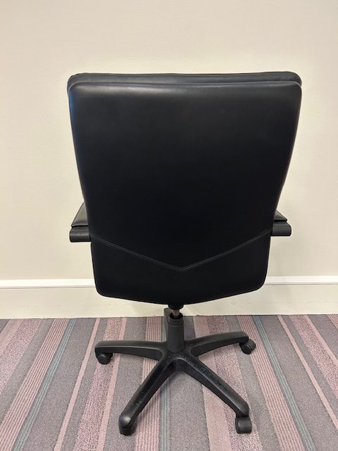 Black vinyl conference chairs