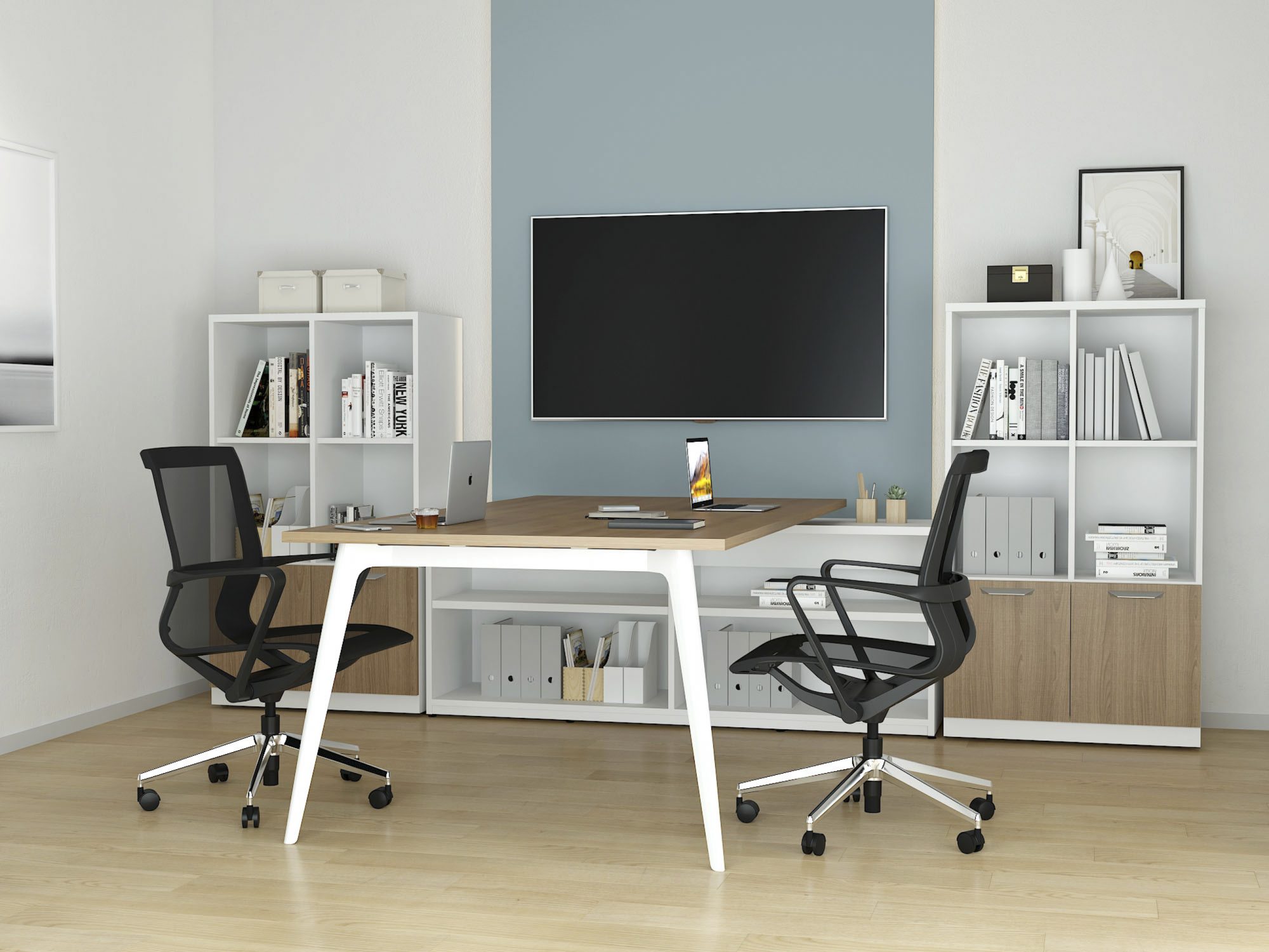 Huddle space with wall TV and chairs